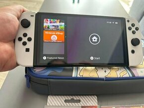 Nintendo Switch Oled + hra, prenosny obal + nahradni sklo