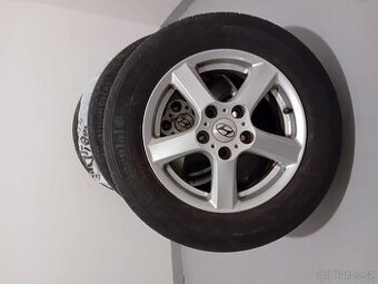 Prodám alu.kola Hyundai.Obuté na letních pneu