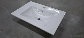 Nové bílé umyvadlo na skříňku 70x45