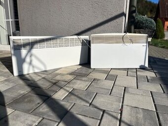 Elektrické přímotopy závěsné (AEG a STIEBEL).