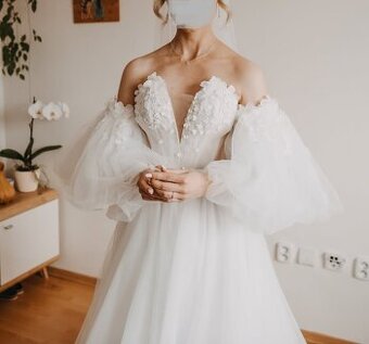 Svatební šaty