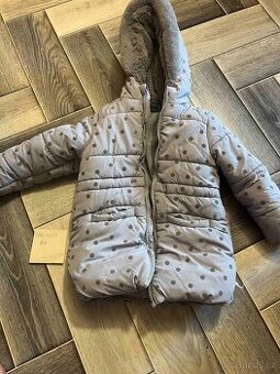 Zimní bundy, oteplovačky a kombinéza