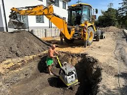 Výkopy,pokládka dlažby, bourání