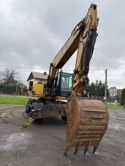 Kolový rypadlo Caterpillar M316D