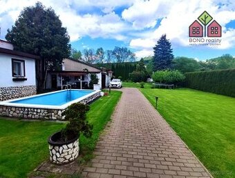 Rodinný dům, 4+1, vejminek 1+1, pozemek 1523 m2, dvě garáže,