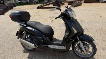 Skutr kymco 250