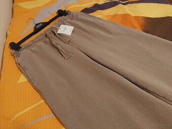 Nove damske teplaky v. L - 1