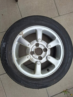 ALU kola Ford 6Jx15 H2 ET 49,5 s letními pneu