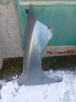 Škoda Octavia II pravý přední blatník