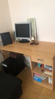 Prodám psací stůl, v dobrém stavu, téměř nový.