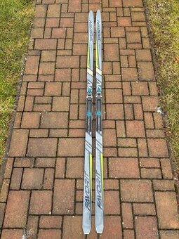 Běžky SPORTEN Favorit 54 Mge s vázáním SALOMON Prolink Race