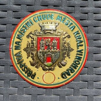 Stará plechová cedule ŽEBRAČENKA přispívá na místní chud