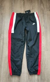 Nové šusťákové kalhoty s podšívkou Nike vel. L - 1