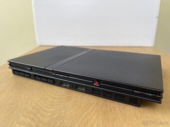 Sony Playstation 2 se zdrojem a TV kabelem