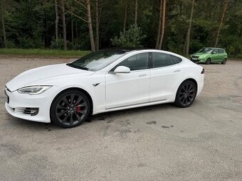 Tesla model S performance .585Kw. 100KW/H baterie