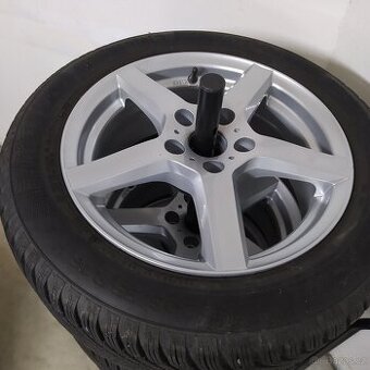Alu disky Dezent s pneu zimní Continental požitá pro Octavia