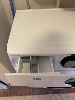 Úzká pračka předem plněná AEG ProSense