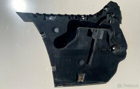 Držák zadního nárazníku levý BMW F11