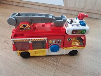 Hasičské auto se světelnými a zvukovými signály