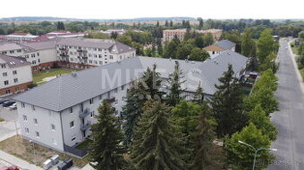 Milovice, pronájem bytu 2+kk/B+sklep + parkovací stání v nov