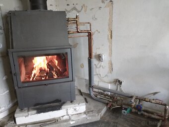 Krbová vložka s teplovodním výměníkem