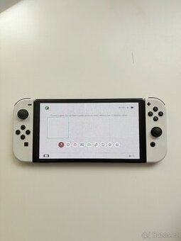 Nintendo Switch OLED v bile barvě