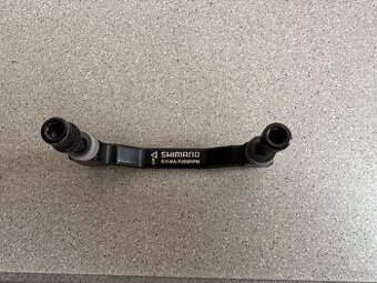 Adaptér kotoučové brzdy Shimano SM-MA-F203P/P (+23 mm)