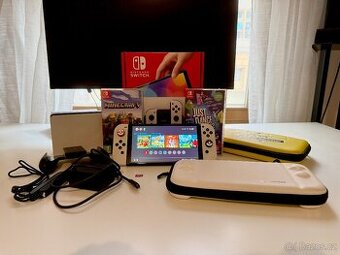 Nintendo Switch OLED bilý + SD karta + 2 pouzdra + 2 hry