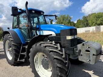 Zemědělský traktor New Holland TM 190, rok výroby 2006. Míst