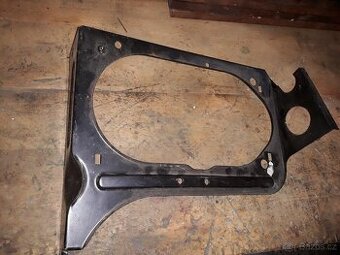 Držák světlometu Škoda