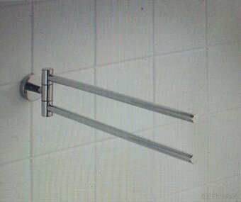 Dvouramenný otočný držák