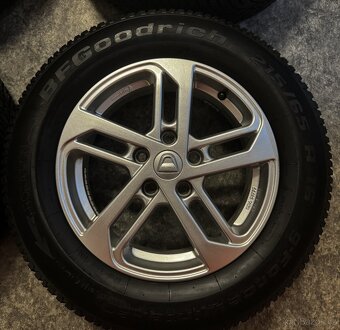 Alu kola Dacia Duster 5×114,3 ET50 + 215/65 R16 pneu zimní