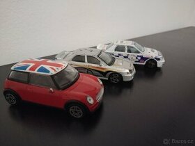 3 auta Burago - Mini Cooper, Subaru Impreza,Ford Sierra