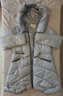 Dámská zimní prošívaná bunda NIAO.XY ve světle modré barvě.