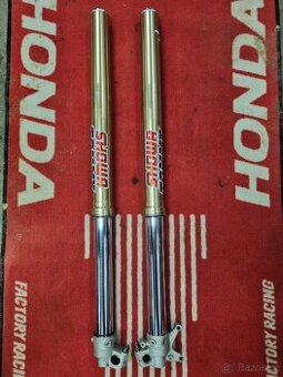 Přední tlumiče showa