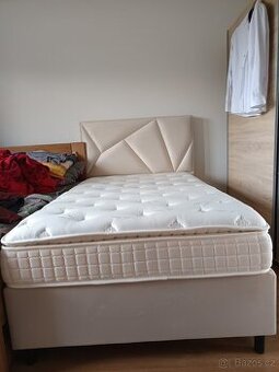 Prodám novou postel s úložným prostorem.