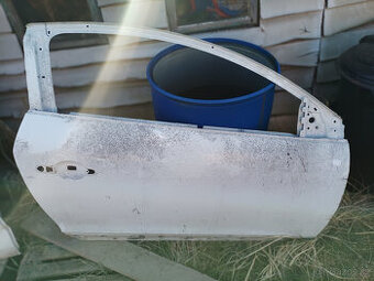 megan 3 ccoupe P dveřě