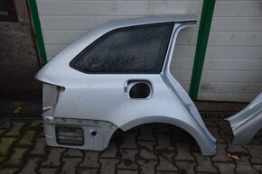 Dveře zadní blatník sklo kufru kufr Octavia III krátká combi