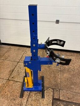 Stahovák na pružiny