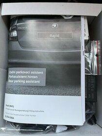 Parkovací zadní asistent Škoda Rapid a mlhová světla