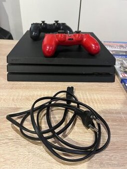 Ps4 pro 1Tb s šestnácti hry,a dvěmi ovladači.