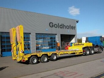 Podvalnik, návěs pro přepravu strojů.