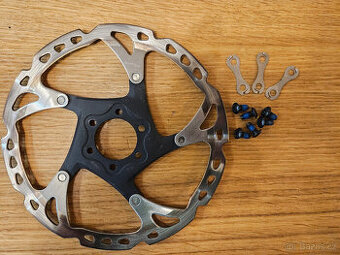 Kotouč Shimano SM-RT76 / 180 mm / 6 děr (ohnutý)