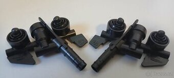 Tryska ostřikovače světlometů