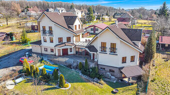 Atypický dům - 4 bytové jednotky na pozemku 2.509 m2, ul. K 