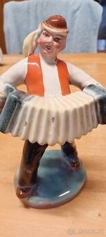 Porcelánová soška harmonika