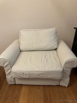Rozkládací křeslo béžové barvy