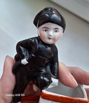 Porcelánový kominíček