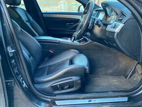 BMW F11 černé kožené sedadla , výhřev , polo-elektrické