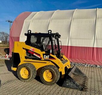 Smykový nakladač Caterpillar 216 B